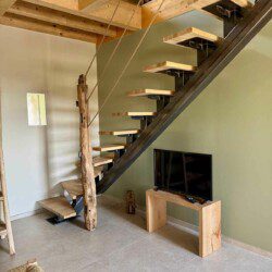 Cette ancienne grange, renommée "La petite maison", abrite une grande suite familiale pouvant accueillir 2 à 6 personnes.